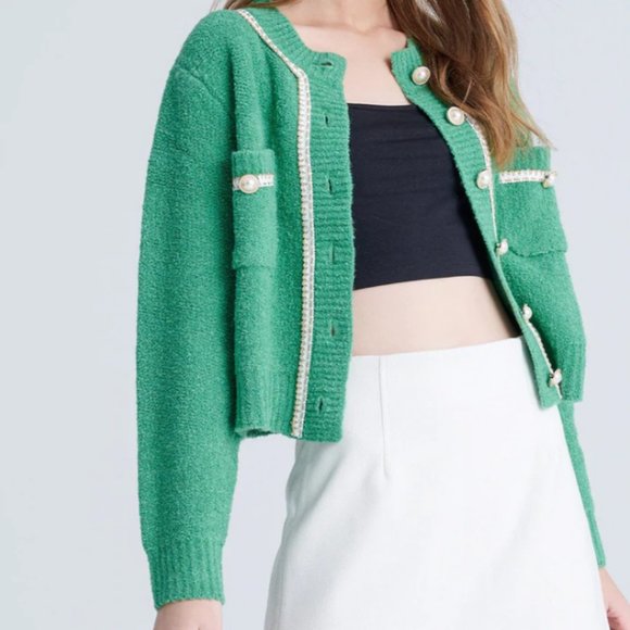 green cardigan with pearls